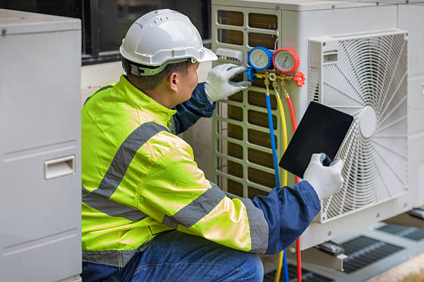 Professional Air Conditioning Repair technician working in Connell, WA